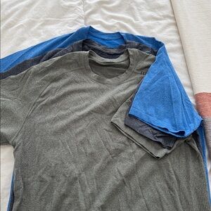 Multiple Lululemon men’s shortsleeved shirts.